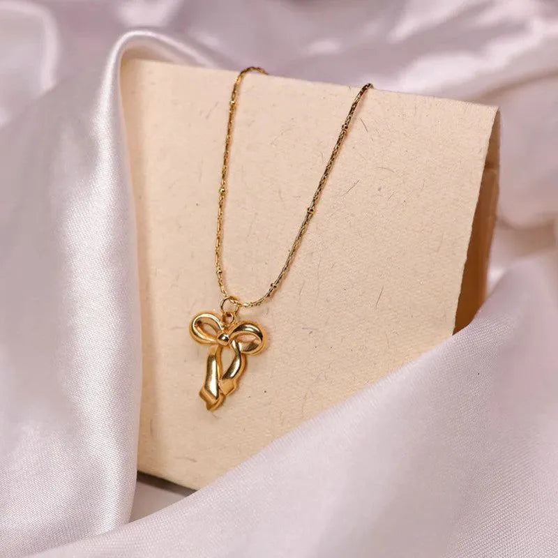 Golden Bow Pendant